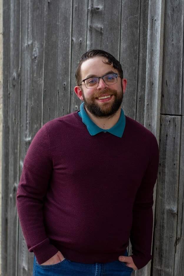Me in front of a barn door